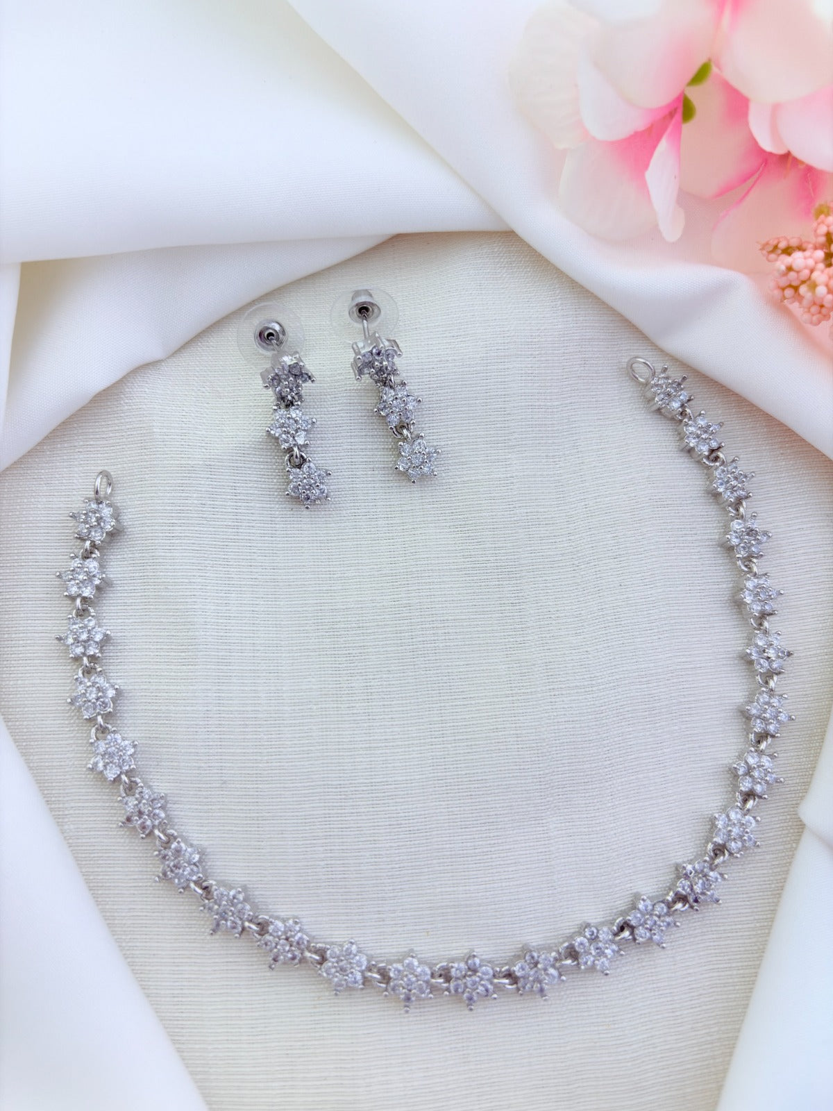 Elegant floral pattern AD stone necklace with matching earrings