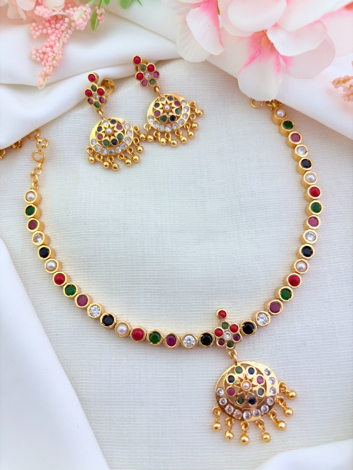 Navaratna color attigai in micro gold polish highlighted with golden beads