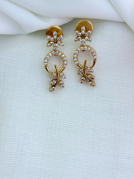 Beautifully crafted Premium matte finish necklace and earrings adorned with AD stones