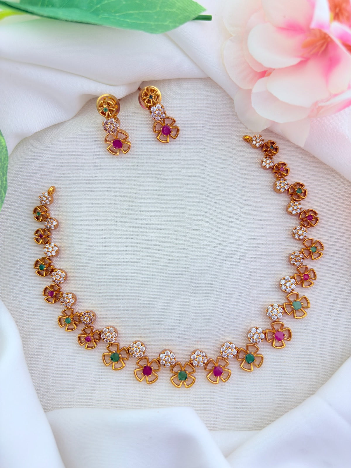 Classic floral pattern necklace in premium matte finsih beautifully designed with AD stones