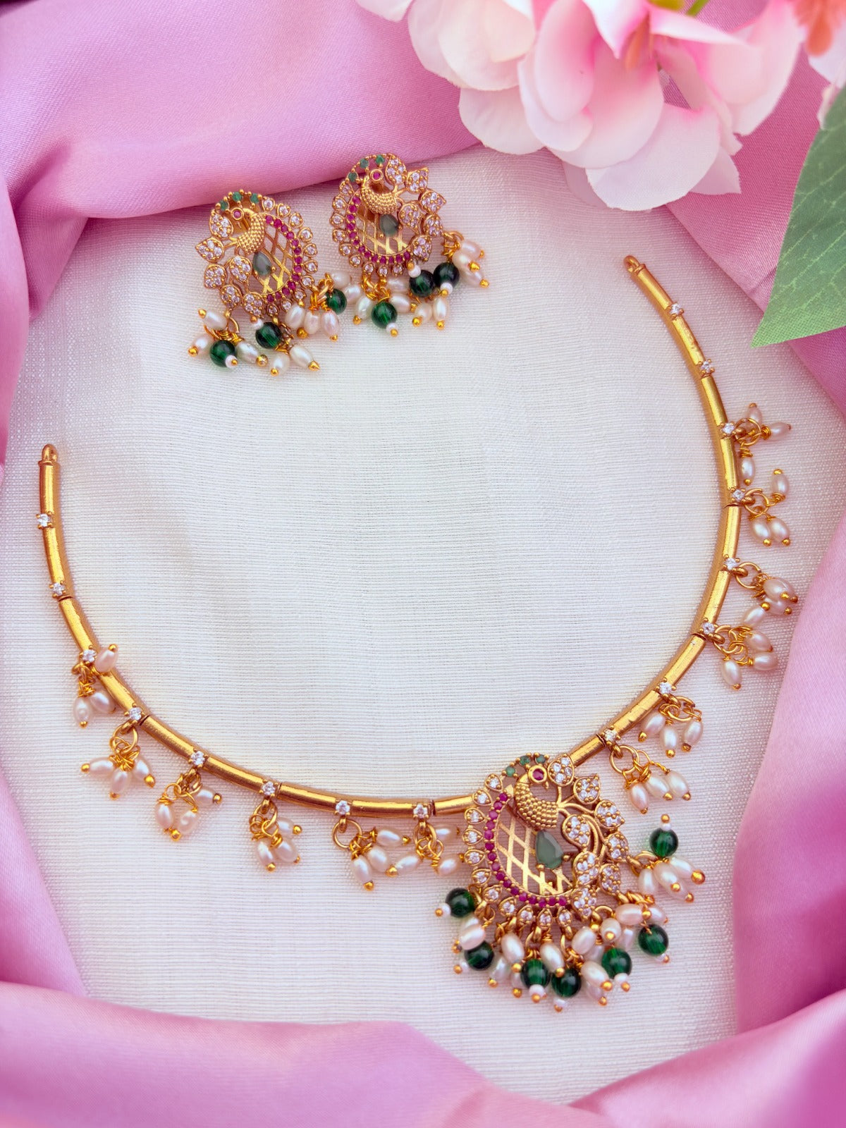 Premium matte finish peacock  necklace adorned with pearl and green beads