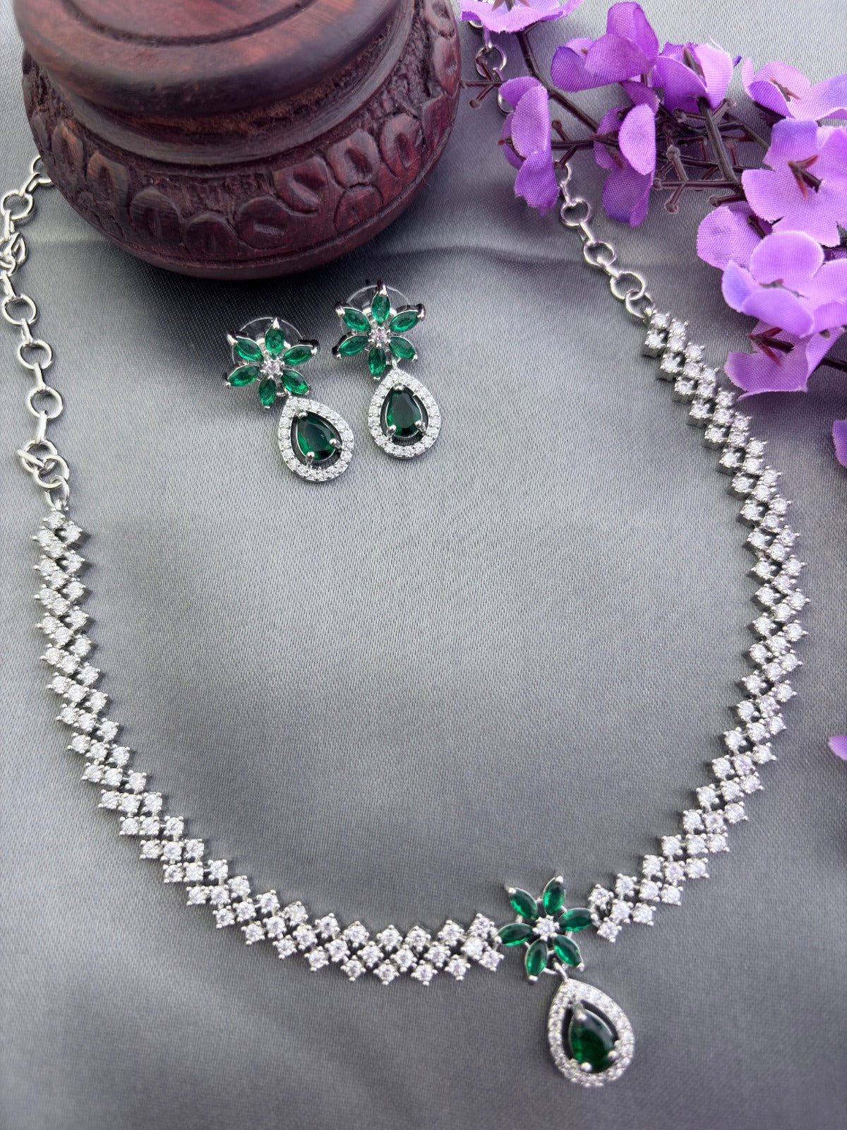 Elegant premium AD stone necklace paired with matching earrings in silver finish