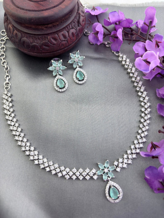 Elegant premium AD stone necklace paired with matching earrings in silver finish