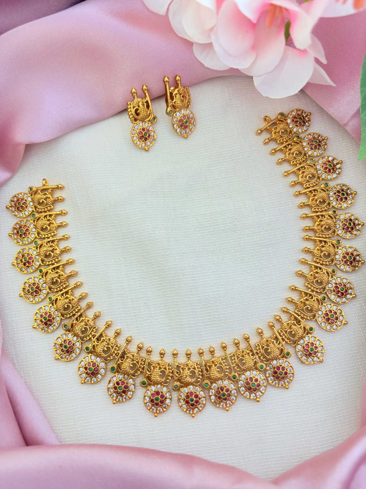 Traditional peacock motif in premium matte finish beautifully crafted with AD stones