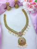 Elegant premium matte finish necklace and jhumka beautifully crafted with classic stones and pearl drops