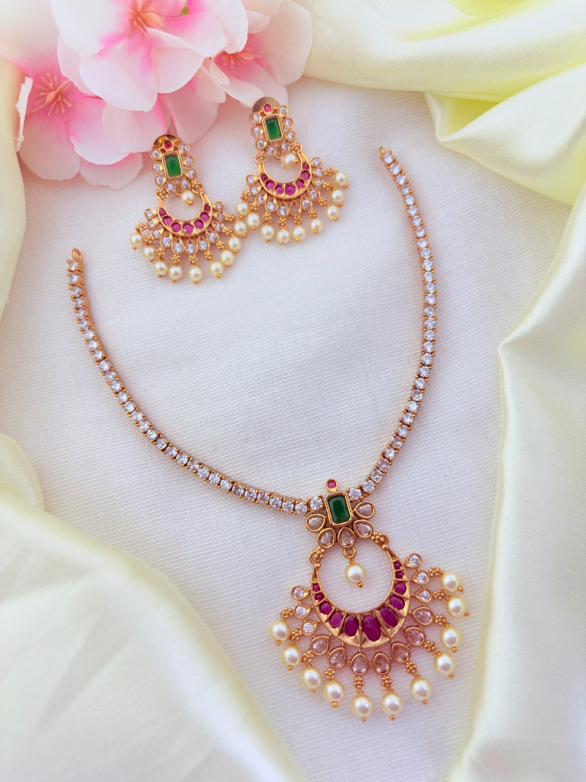 Premium matte finish necklace beautifully crafted with classic stones and pearl drops