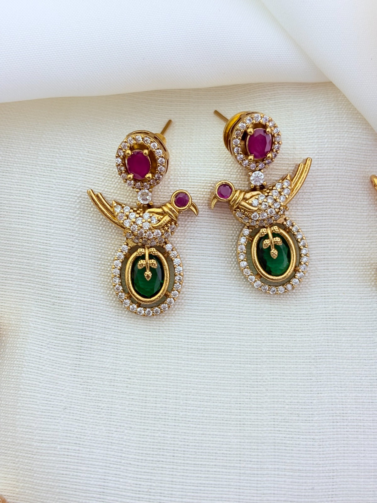 Peacock pattern in modern elegance crafted with classic stones - premium matte finish necklace with matching earrings