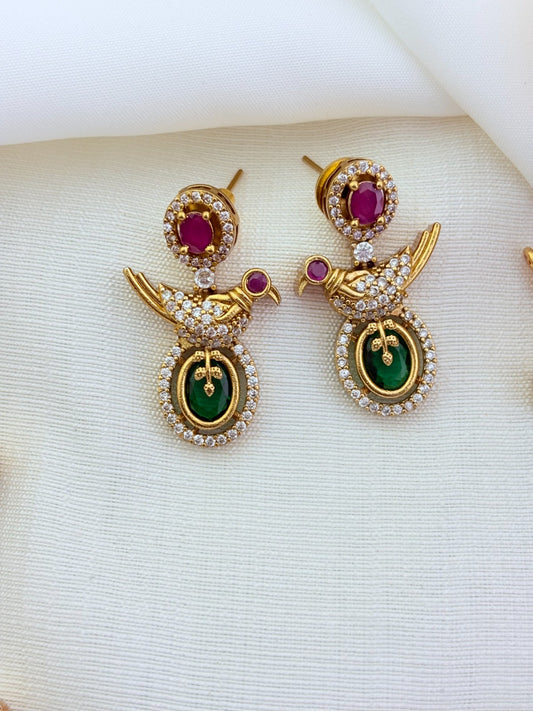 Peacock pattern in modern elegance crafted with classic stones - premium matte finish necklace with matching earrings