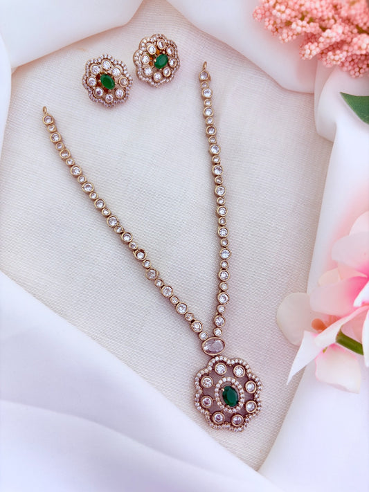 Elegant premium matte finish floral pendant necklace and matching earrings adorned wtih CZ stones