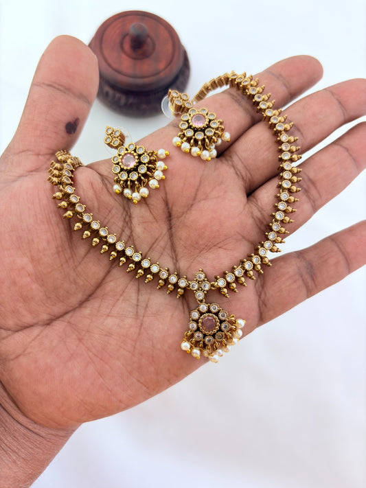 Premium matte antique polish AD necklace and earrings adorned with pearl drops