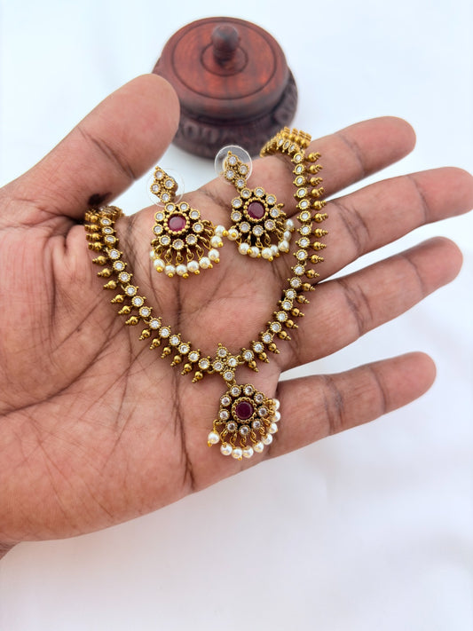 Premium matte antique polish AD necklace and earrings adorned with pearl drops