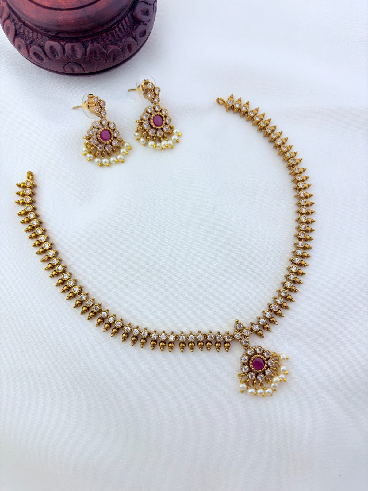 Premium matte antique polish AD necklace and earrings adorned with pearl drops