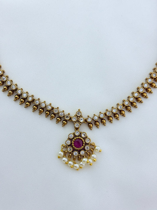 Premium matte antique polish AD necklace and earrings adorned with pearl drops