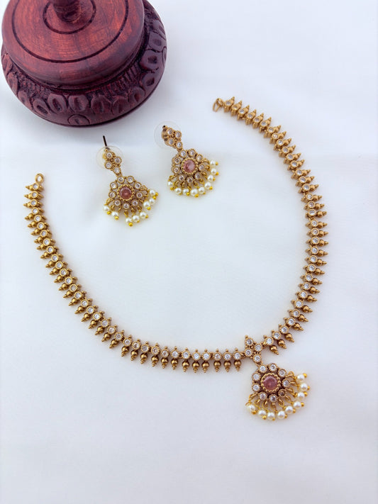 Premium matte antique polish AD necklace and earrings adorned with pearl drops