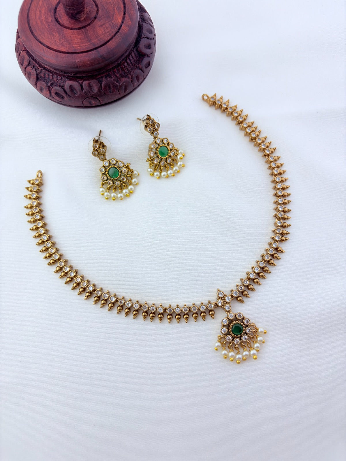 Premium matte antique polish AD necklace and earrings adorned with pearl drops