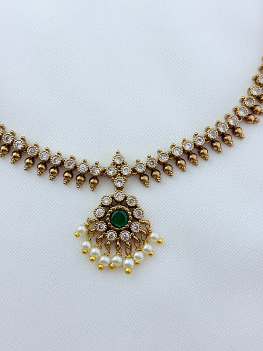 Premium matte antique polish AD necklace and earrings adorned with pearl drops