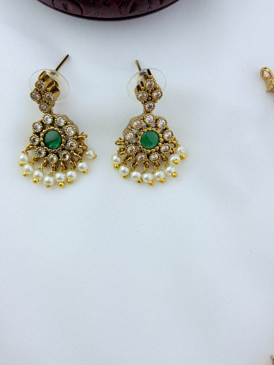 Premium matte antique polish AD necklace and earrings adorned with pearl drops