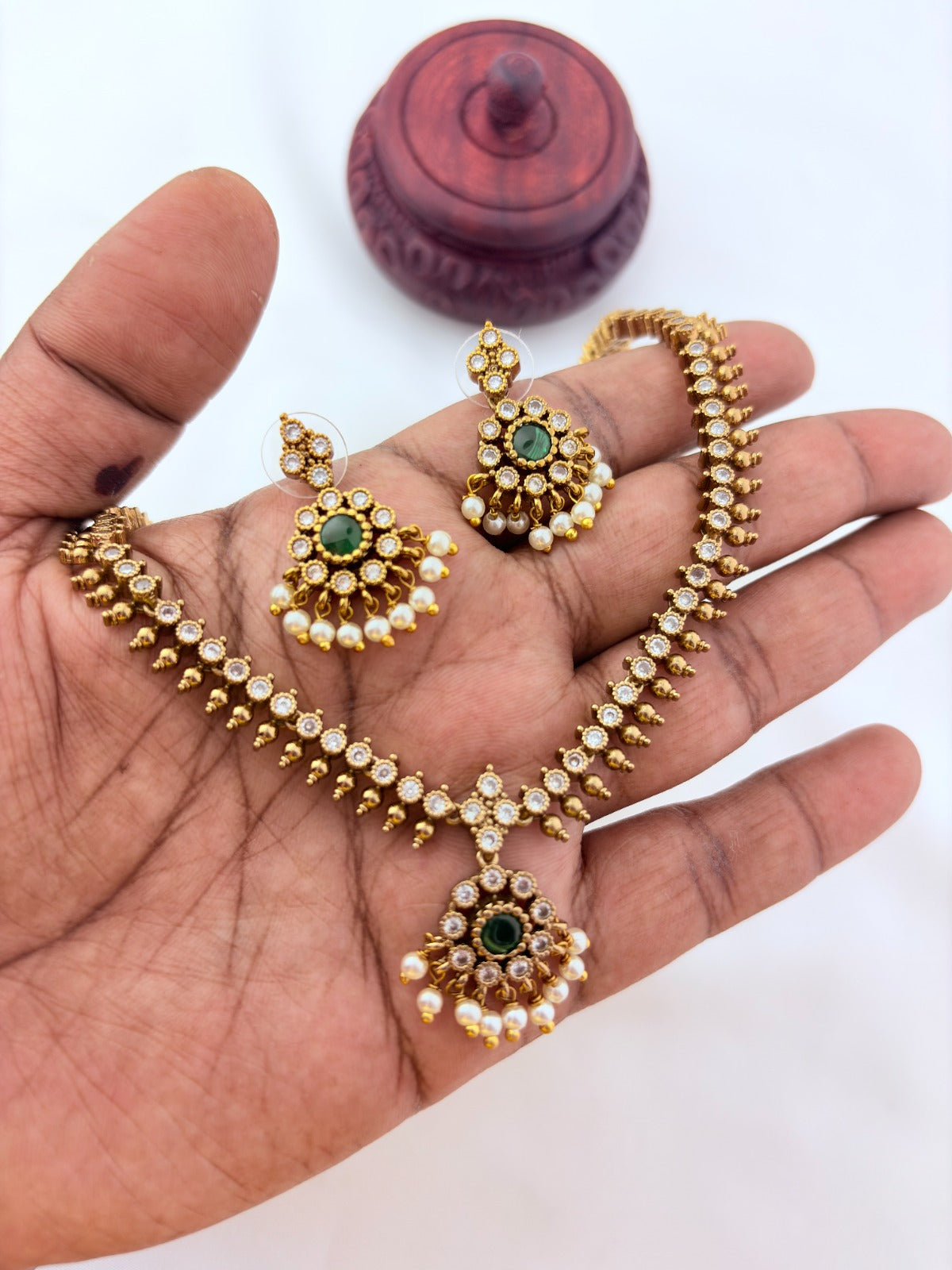 Premium matte antique polish AD necklace and earrings adorned with pearl drops