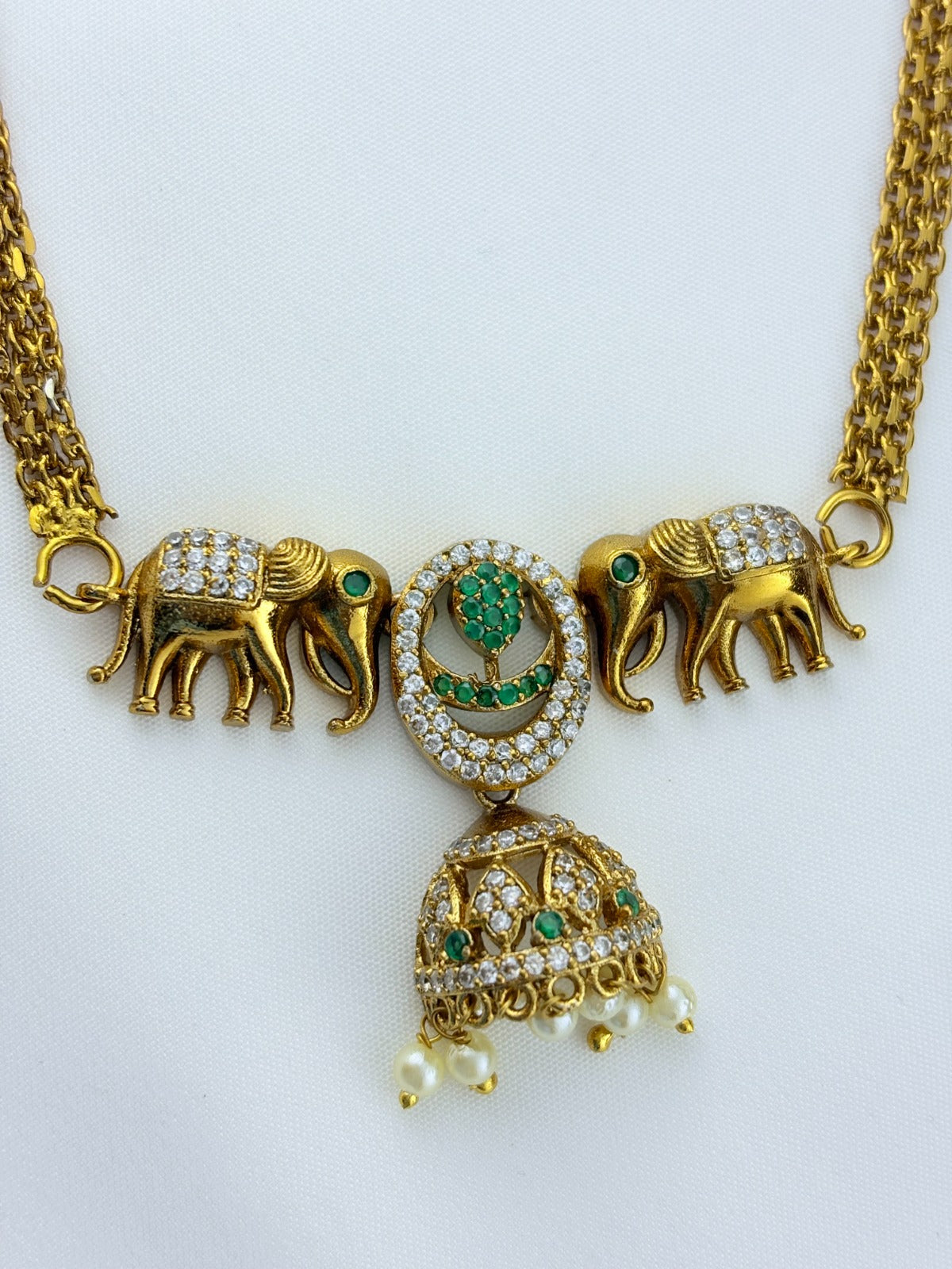 Premium matte finish Elephant motif necklace adorned with pearl drops