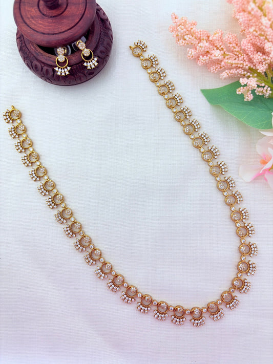 Premium matte finish haram and earrings crafted with classic AD stones