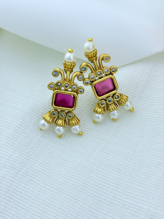 Traditional pattern  premium matte finish necklace and matching earrings crafted with stones and pearls