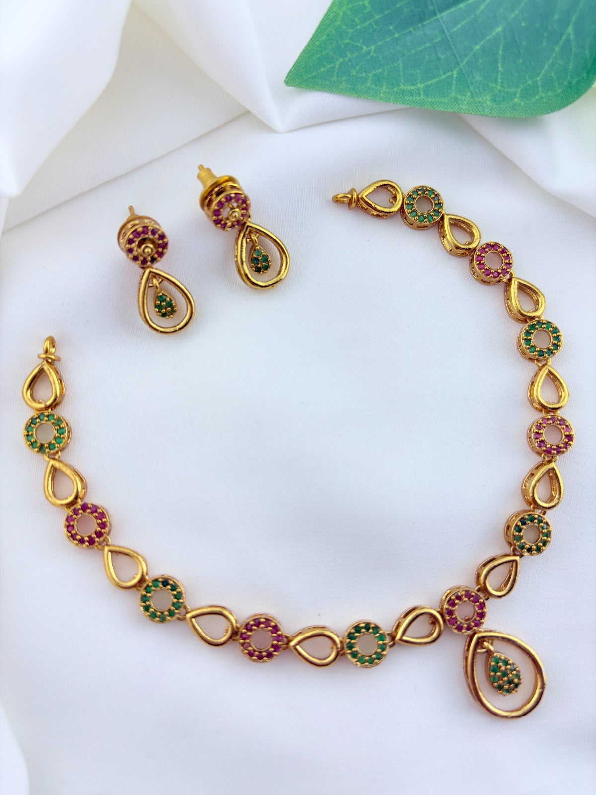 Stylish and elegance  adorned with AD stones - Premium matte finish necklace with matching earrings