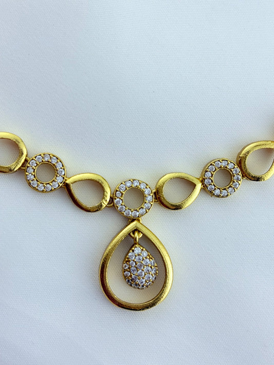 Stylish and elegance  adorned with AD stones - Premium matte finish necklace with matching earrings