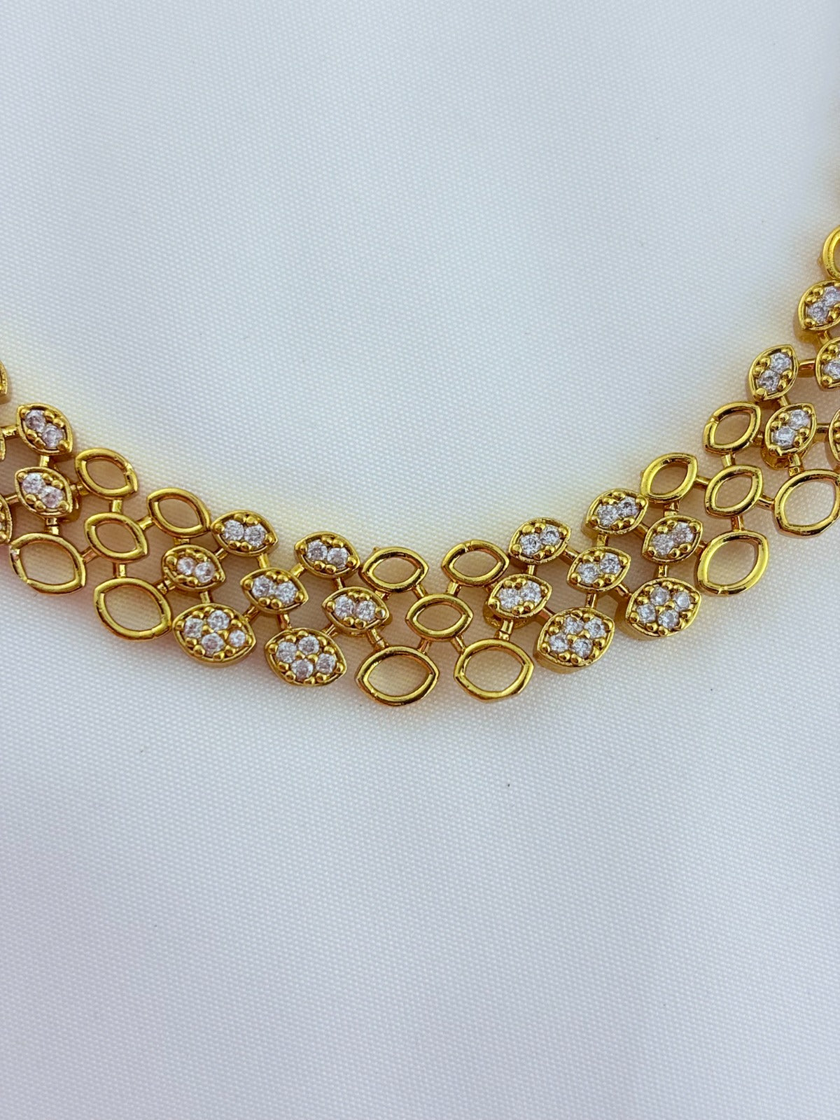 Modern and elegance crafted with AD stones - Matte finish necklace with matching earrings