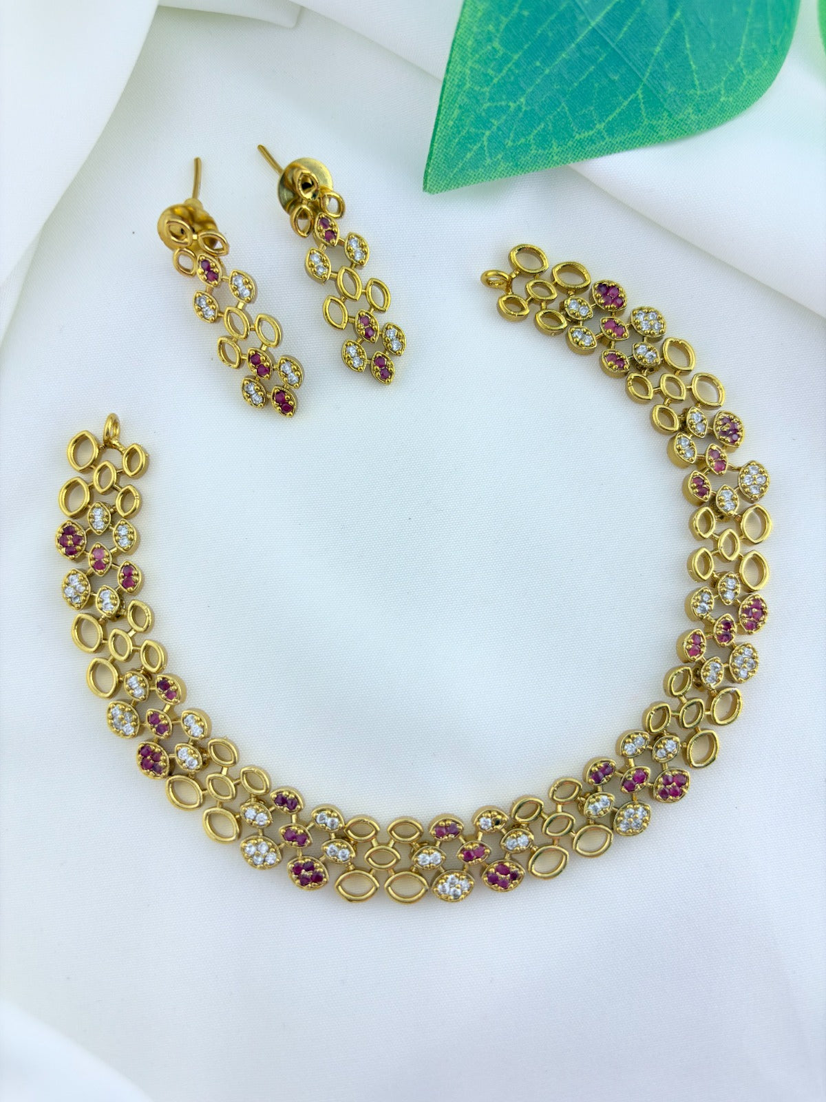 Modern and elegance crafted with AD stones - Matte finish necklace with matching earrings