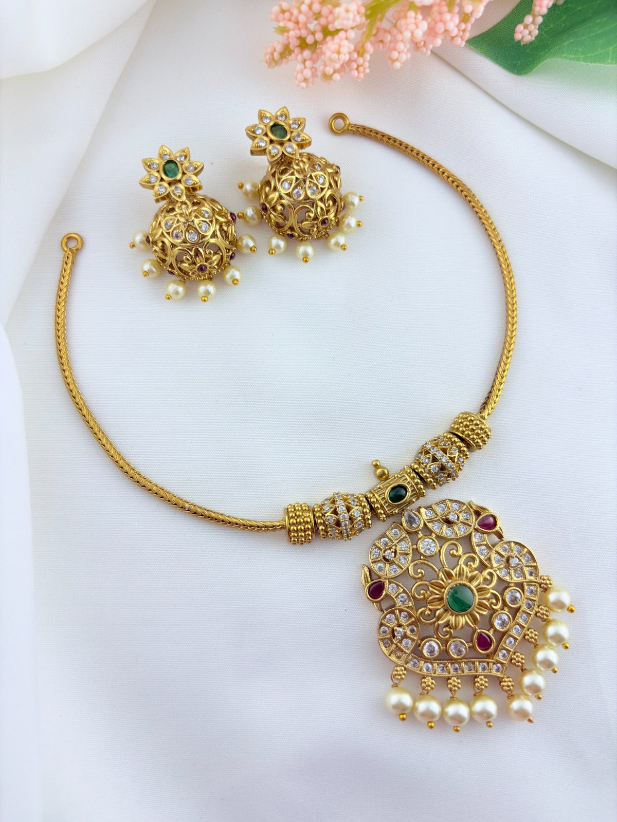 Premium matte finish classic AD stones multi color pendant with matching jumkha adorned with pearl drops