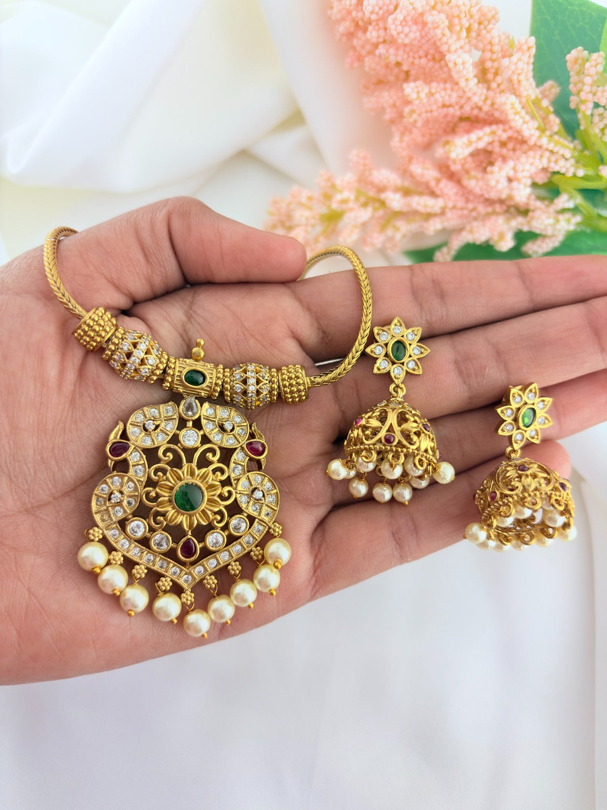 Premium matte finish classic AD stones multi color pendant with matching jumkha adorned with pearl drops