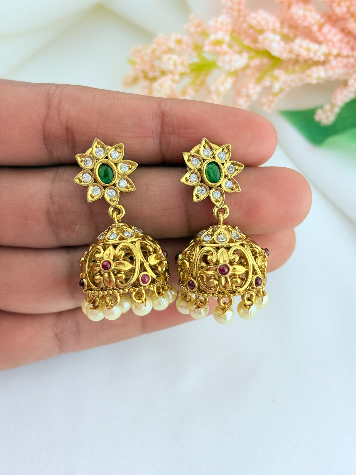 Premium matte finish classic AD stones multi color pendant with matching jumkha adorned with pearl drops