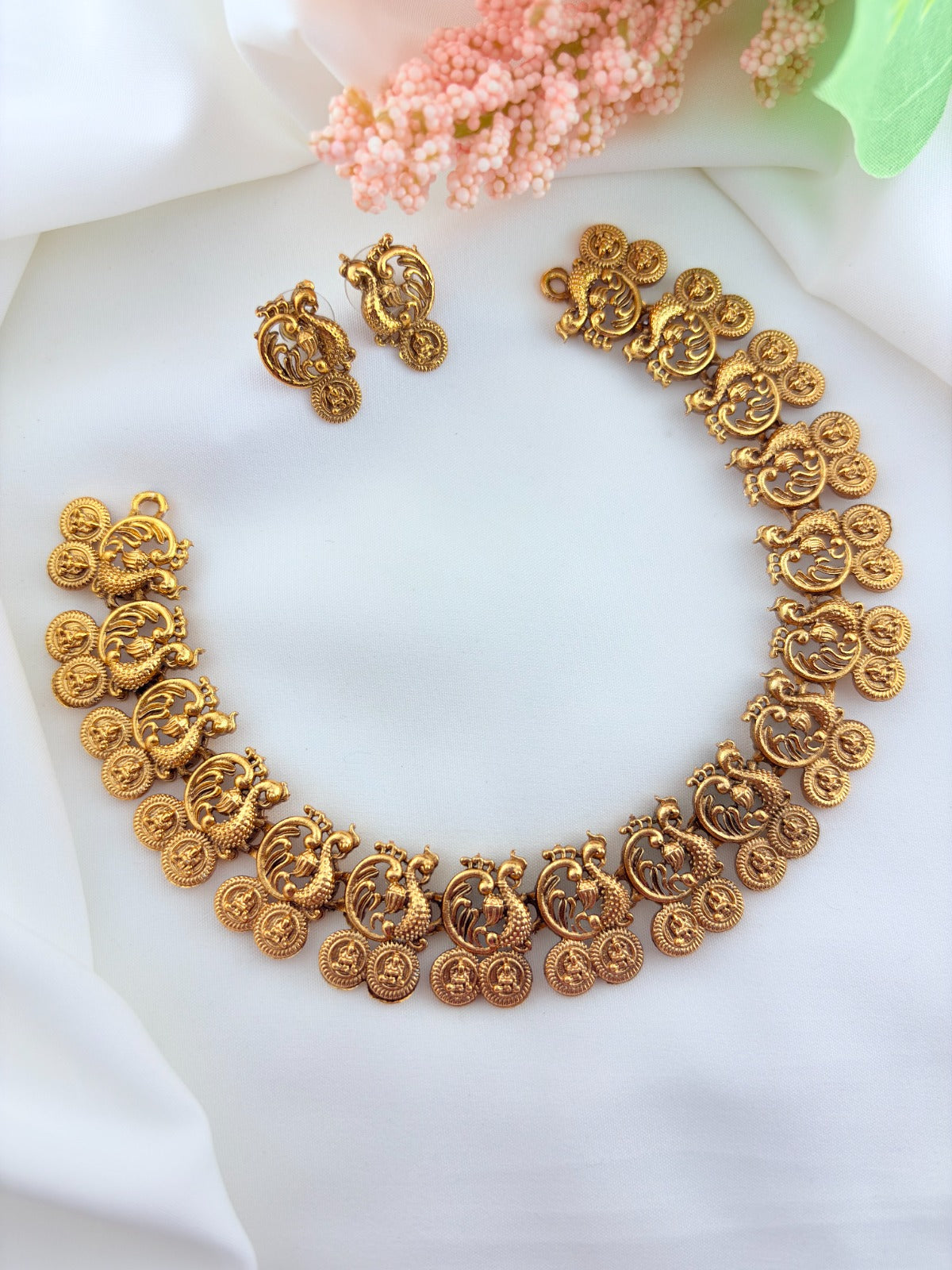 Traditional peacock motif necklace in matte finish with matching earrings