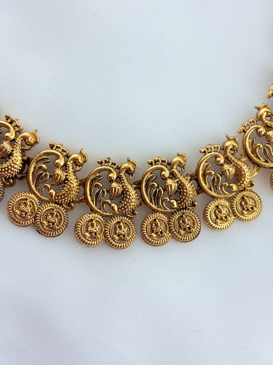 Traditional peacock motif necklace in matte finish with matching earrings