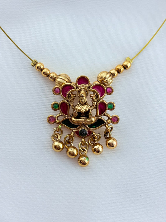 Trendy invisible chain with divine touch - Lakshmi pendant  and matching stud adorned with golden beads