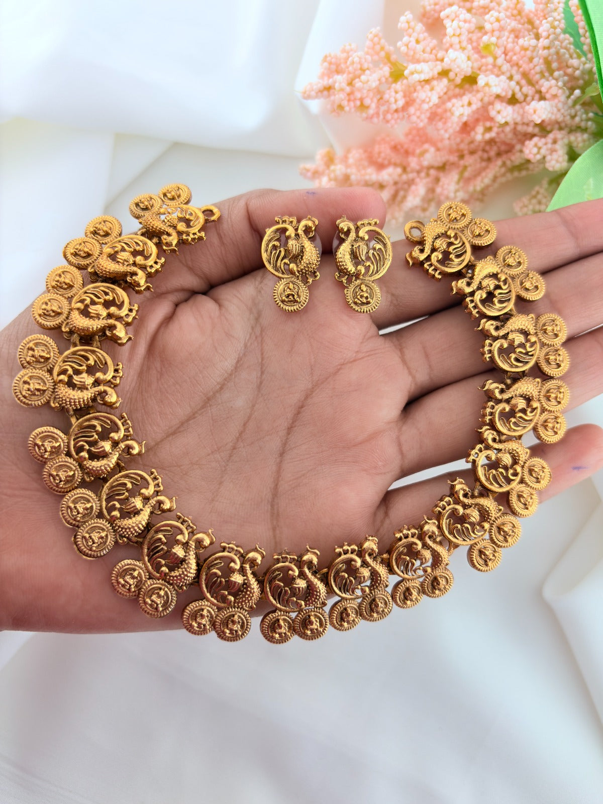 Traditional peacock motif necklace in matte finish with matching earrings