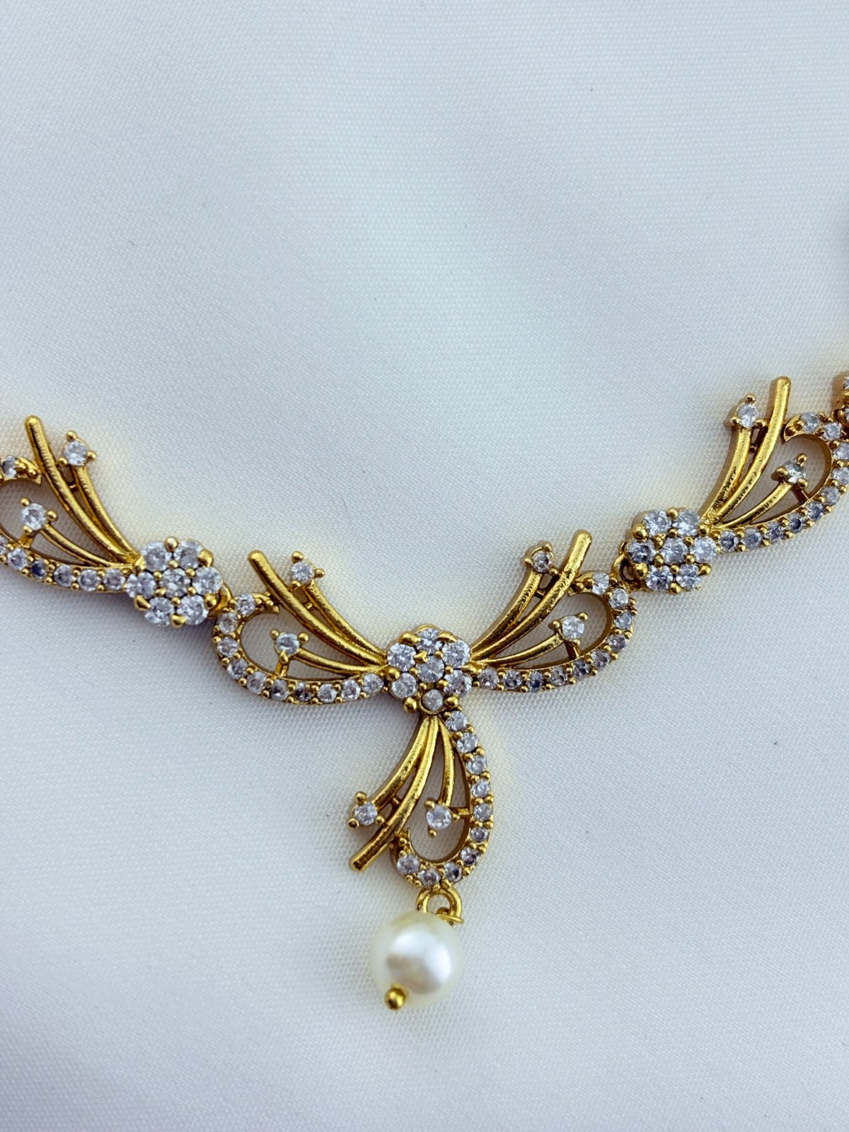 Beautifully crafted  premium Ad necklace and matching earrings with pearl drops