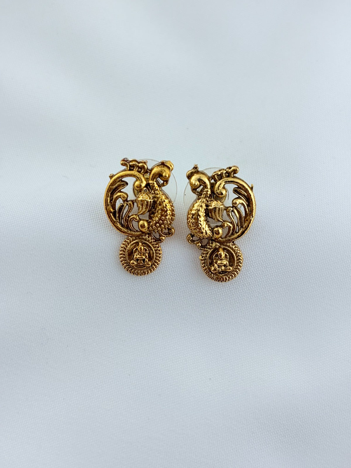 Traditional peacock motif necklace in matte finish with matching earrings