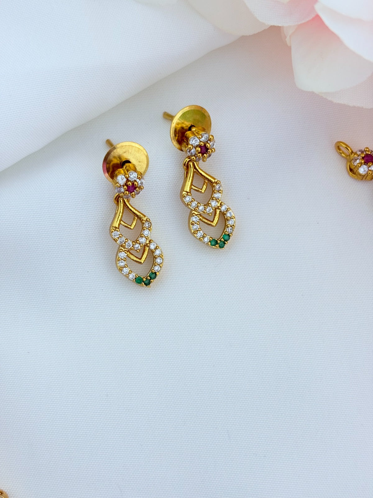 Premium matte finish necklace and earrings adorned with classic AD stones