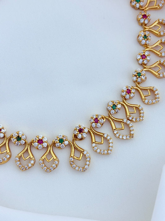 Premium matte finish necklace and earrings adorned with classic AD stones