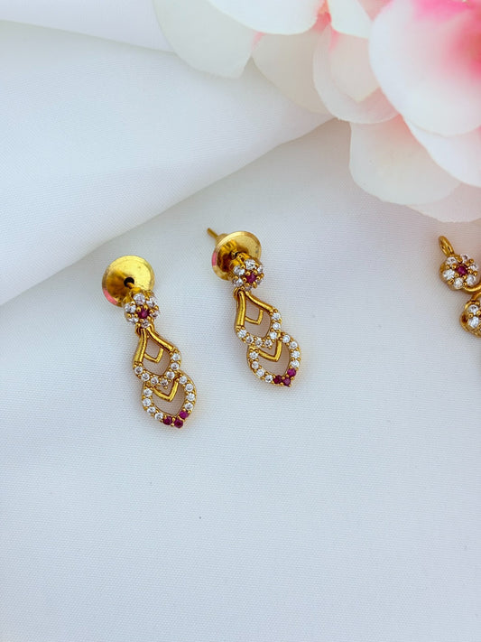 Premium matte finish necklace and earrings adorned with classic AD stones