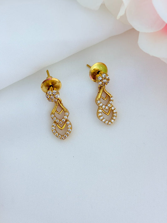 Premium matte finish necklace and earrings adorned with classic AD stones