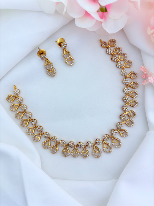 Premium matte finish necklace and earrings adorned with classic AD stones