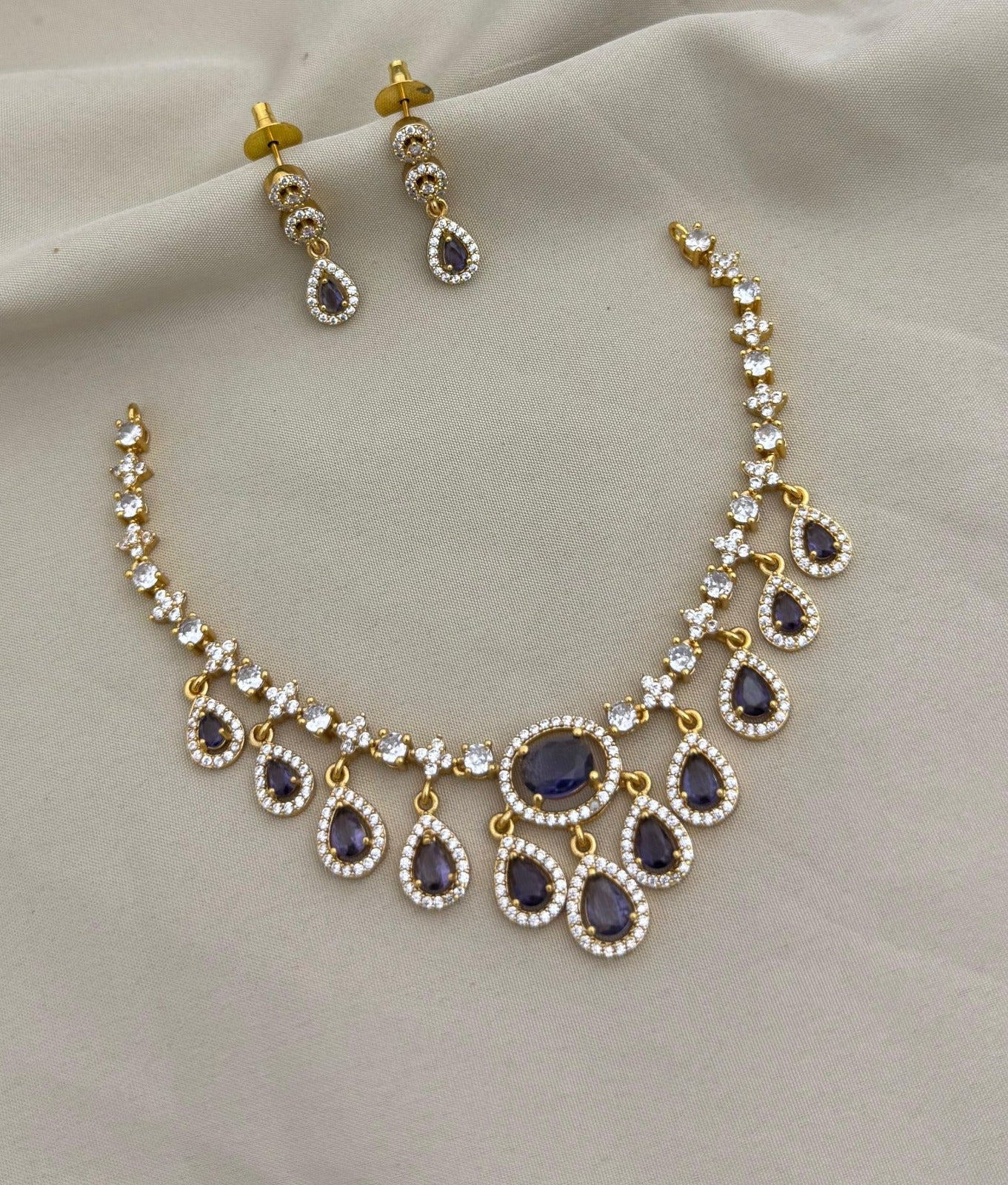 Minimal design with a premium finish necklace with matching earrings