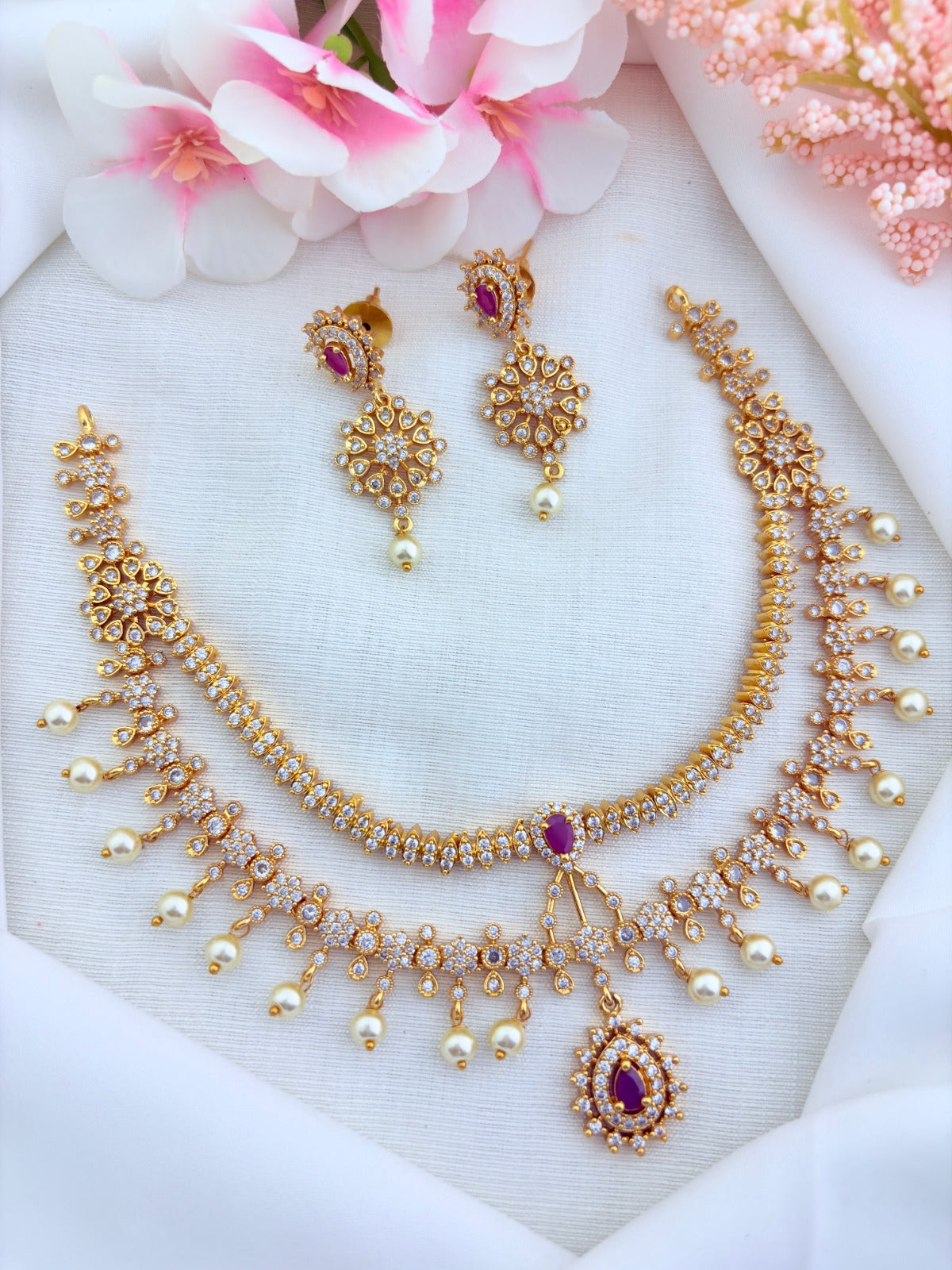 Premium matte finish two layer necklace beautifully designed with classic stones and pearl drops