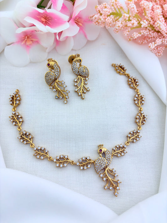 Stylish matte finish necklace featuring peacock design adorned with AD stones