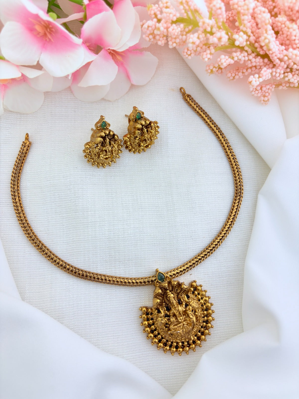 Tradition in modern elegance - Premium matte finish Lakshmi pendant necklace with matching earrings