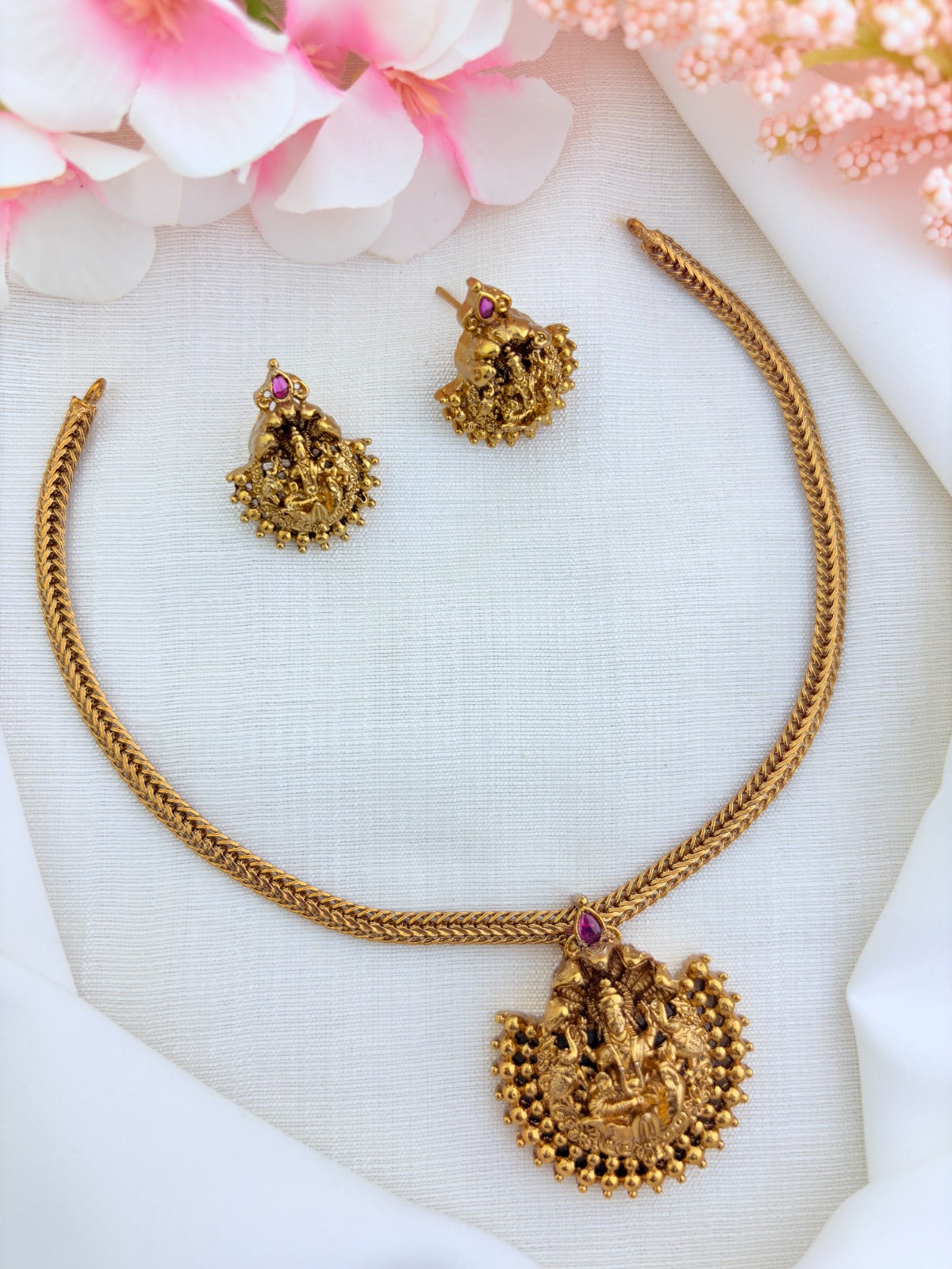 Tradition in modern elegance - Premium matte finish Lakshmi pendant necklace with matching earrings