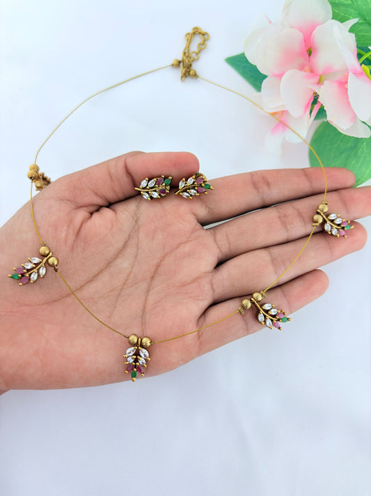 Premium invisible  chain adorned with AD stone leaf pendant