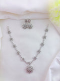 Premium silver polish neckset with matching earrings beautifully crafted with AD stones